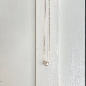 W.Rosado pearl ID necklace .